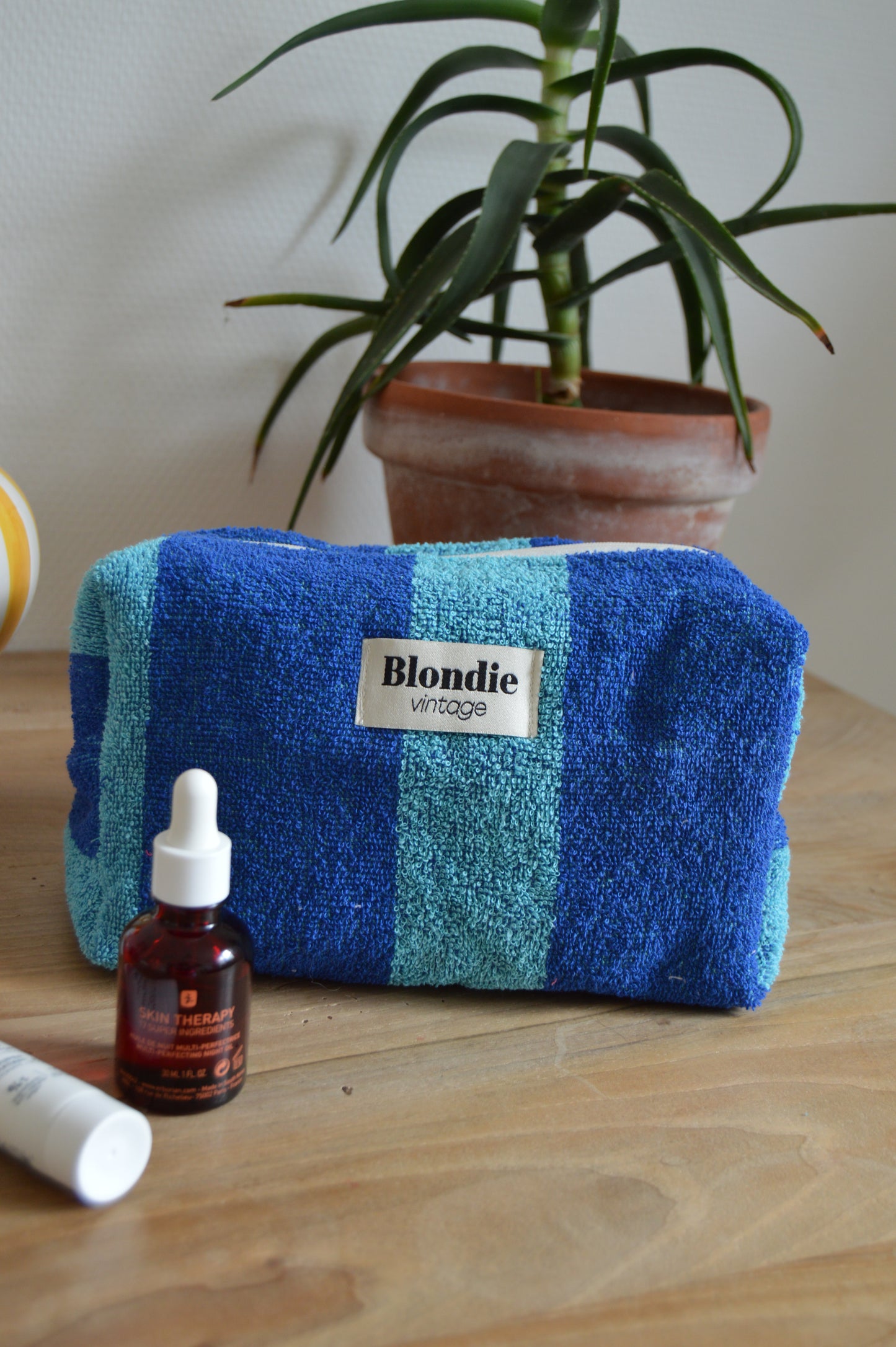 trousse de toilette en éponge