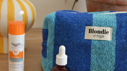 Trousse de toilette en éponge bleu