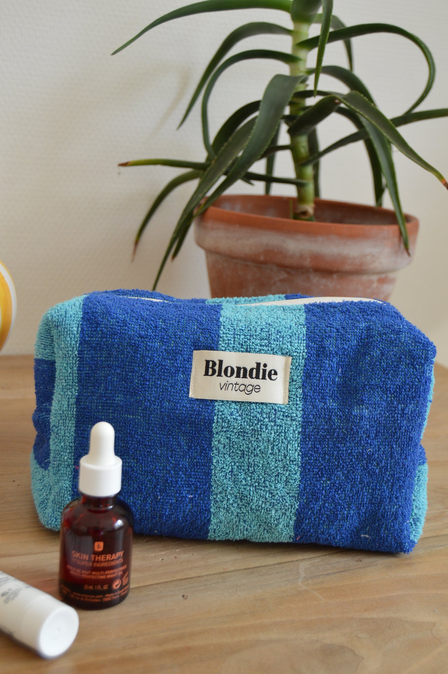 Trousse de toilette en éponge bleu