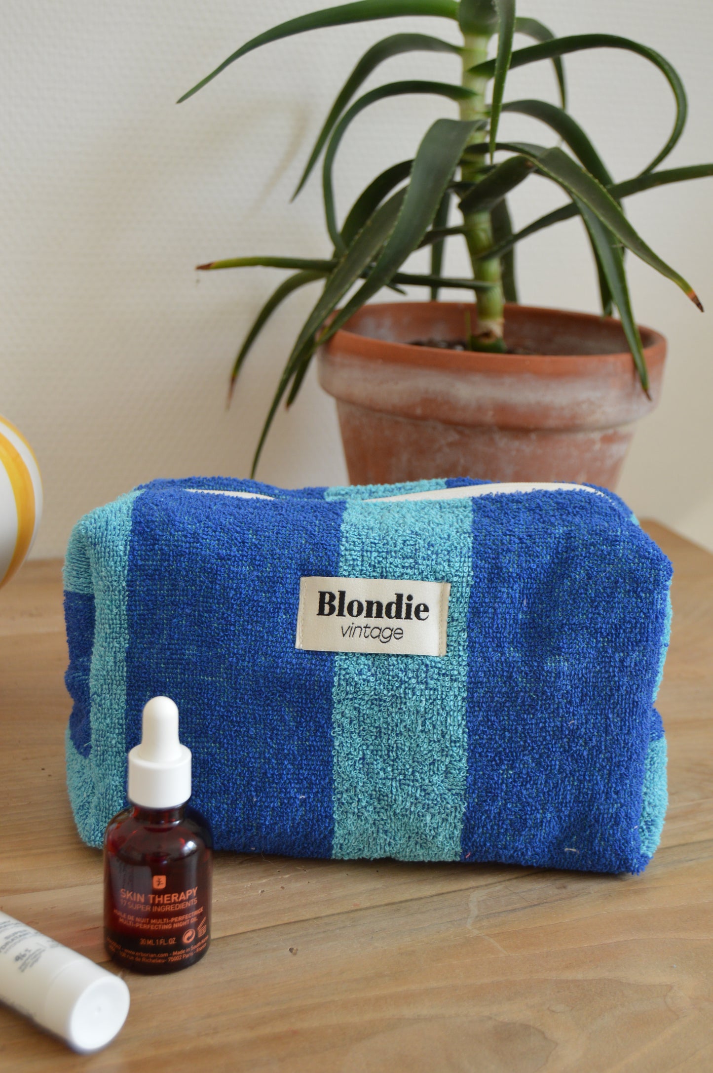 Trousse de toilette en éponge bleu