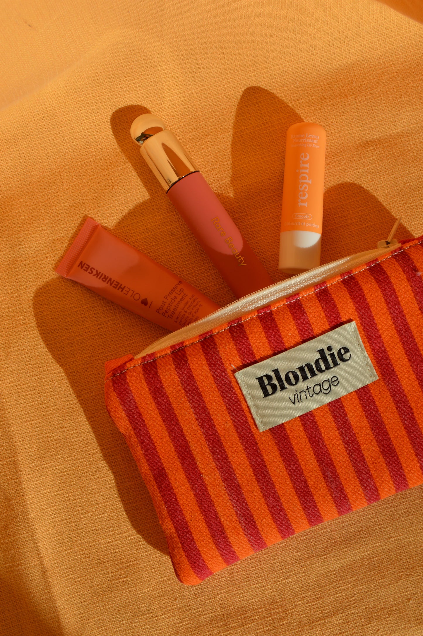 Mini pochette à rayures orange