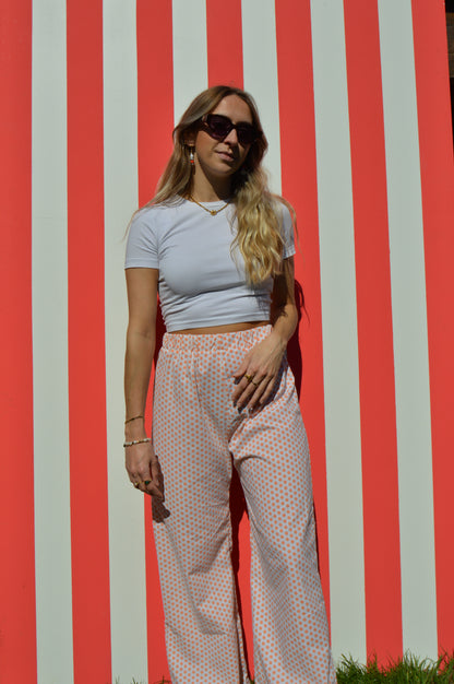 Pantalon à petite fleurs orange