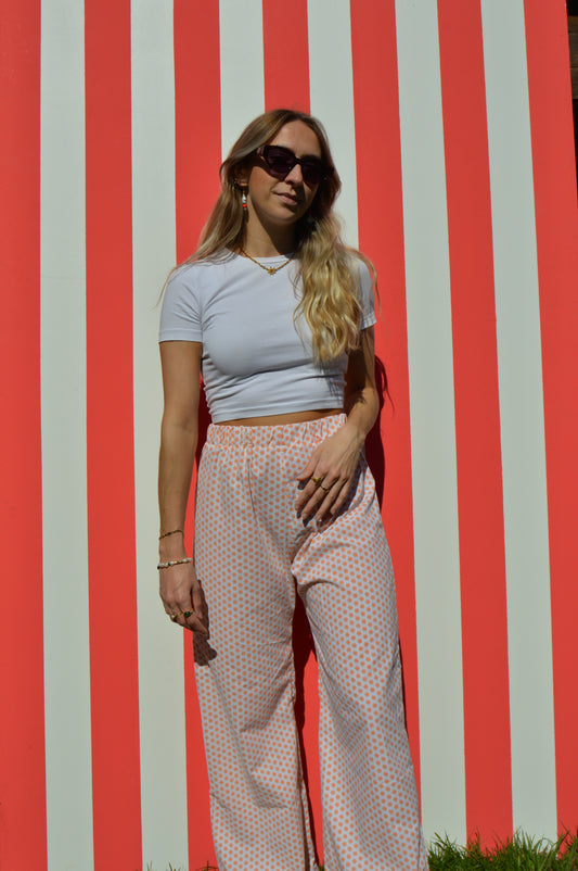 Pantalon à petite fleurs orange