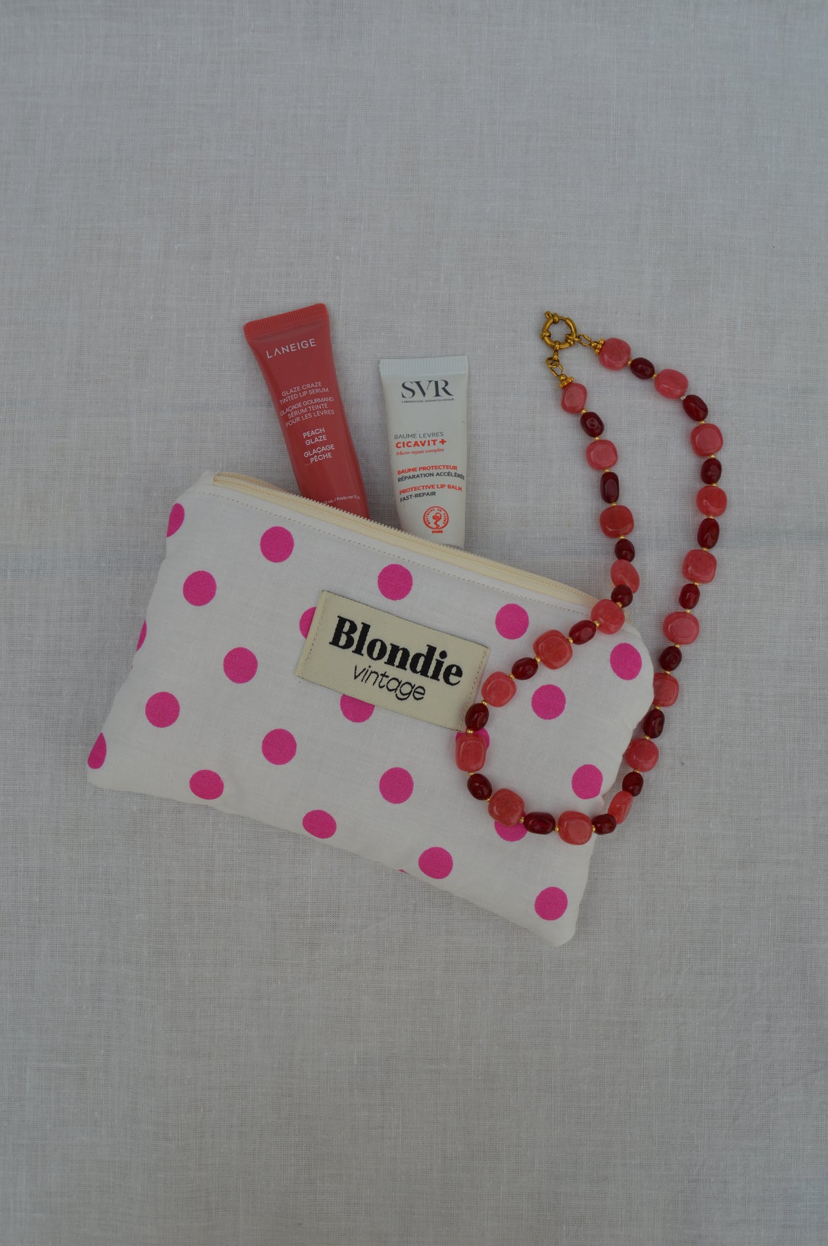 Mini pochette à pois rose confectionnée à la main à partir d'un tissu vintage upcyclé