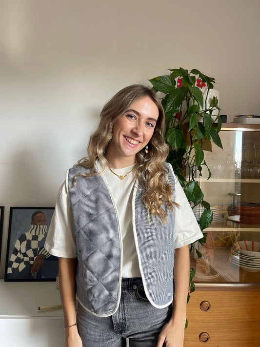 Gilet sans manches pied de poule noir