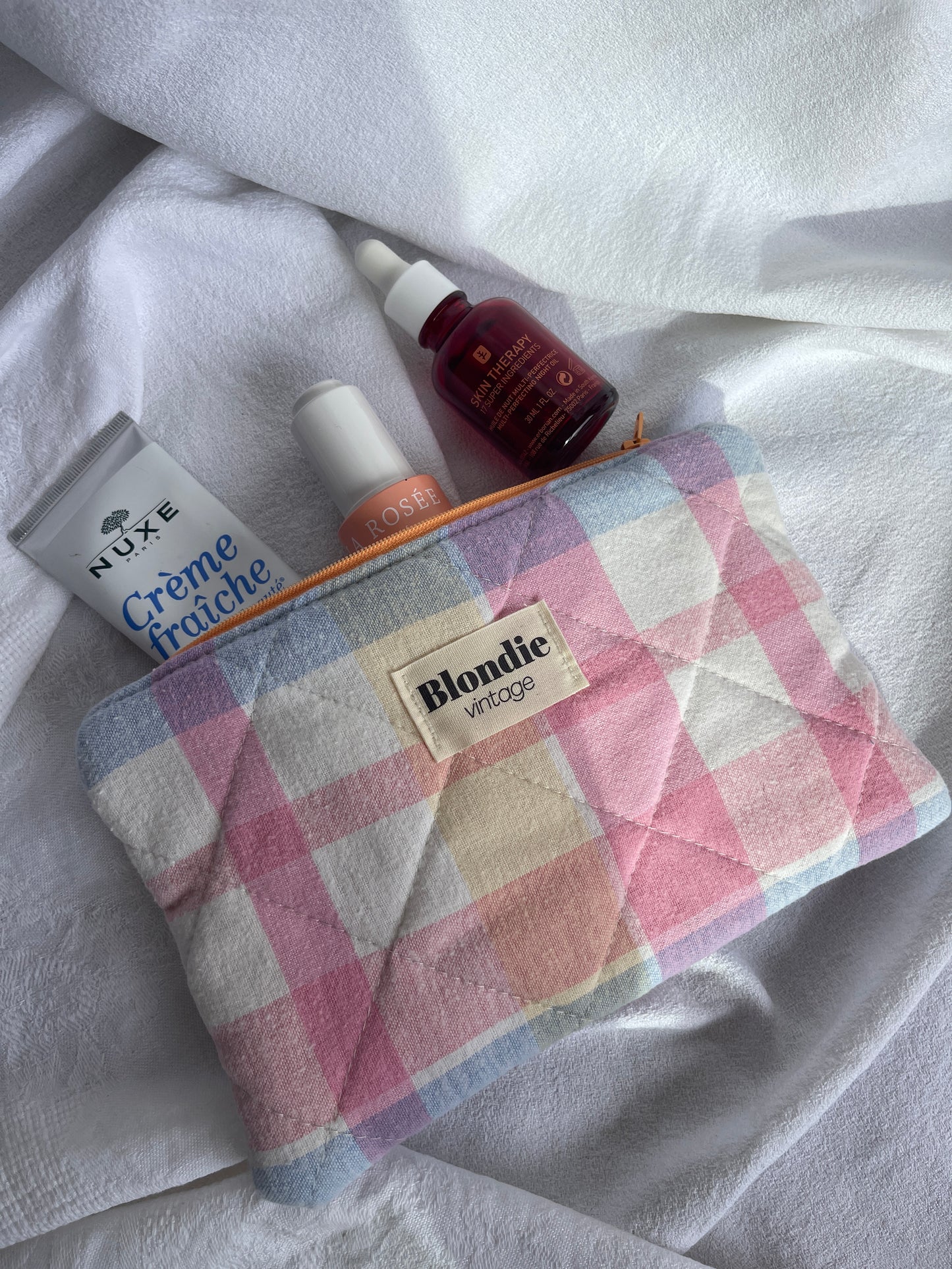 Moyenne pochette à carreaux rose
